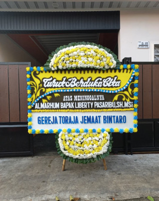 Papan Bunga Duka di Sambit